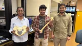 Dr. Champa Jayasuriya, Shyama Tripathy and me in the lab. Dr. Jayasuriya holds a pelvis model and Shyama a femur; I am on the right.