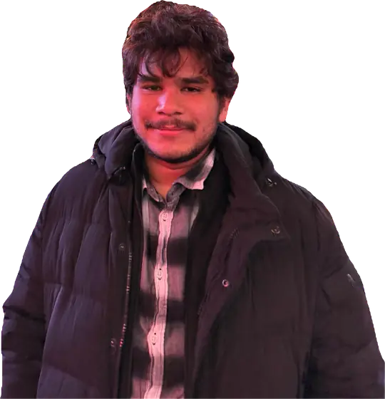Syam Sundar Nallamekala in a dark jacket, photographed informally against a plain background.
