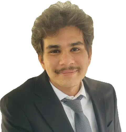 Syam Sundar Nallamekala, photographed in a dark suit and tie, facing the camera.